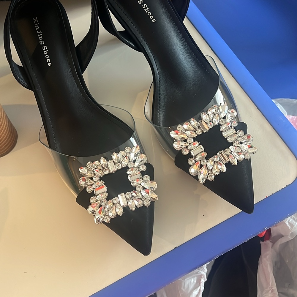 Black stilettos and Clear Embellished Heels